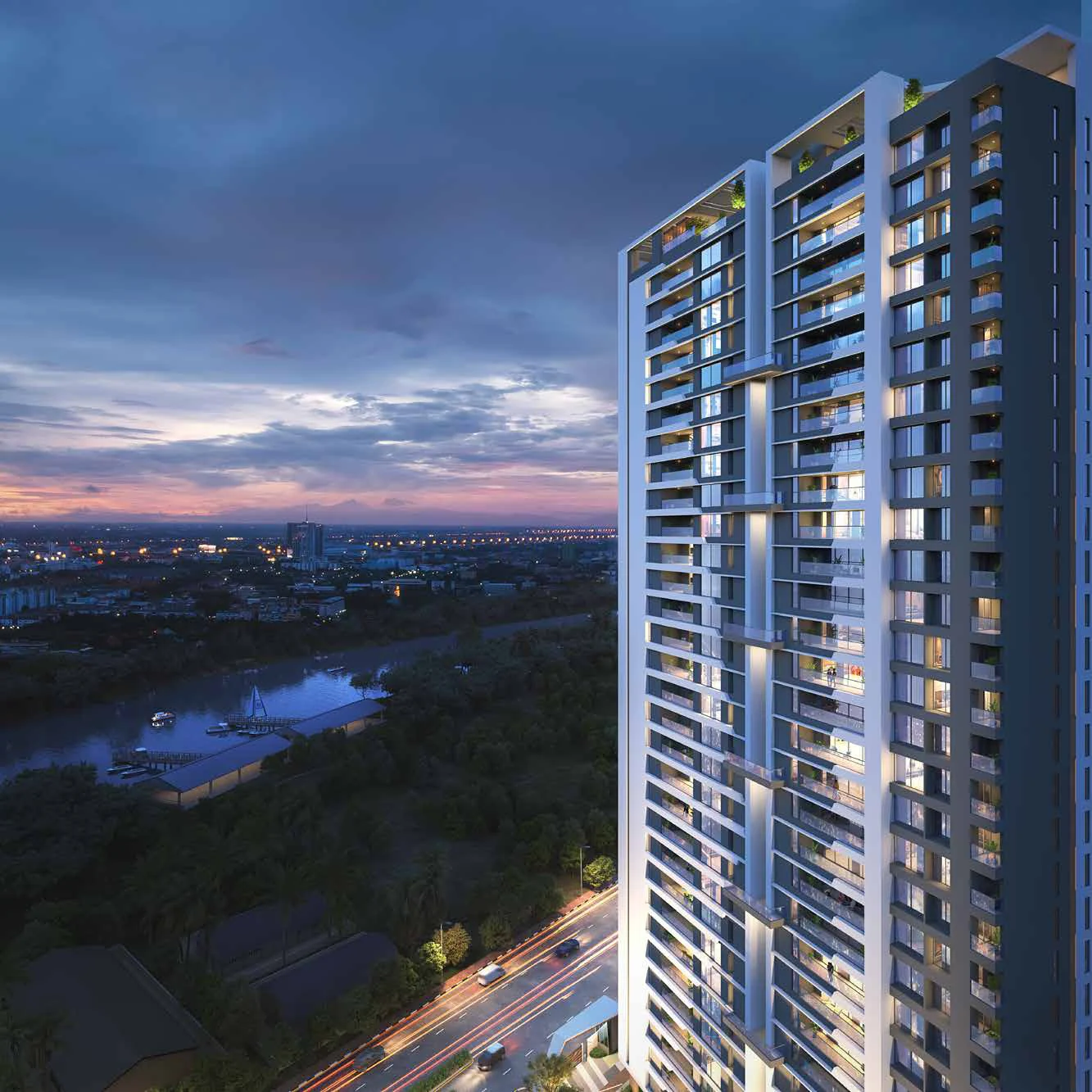 Tower at dusk with balconies lit up at Nirvana, Baner