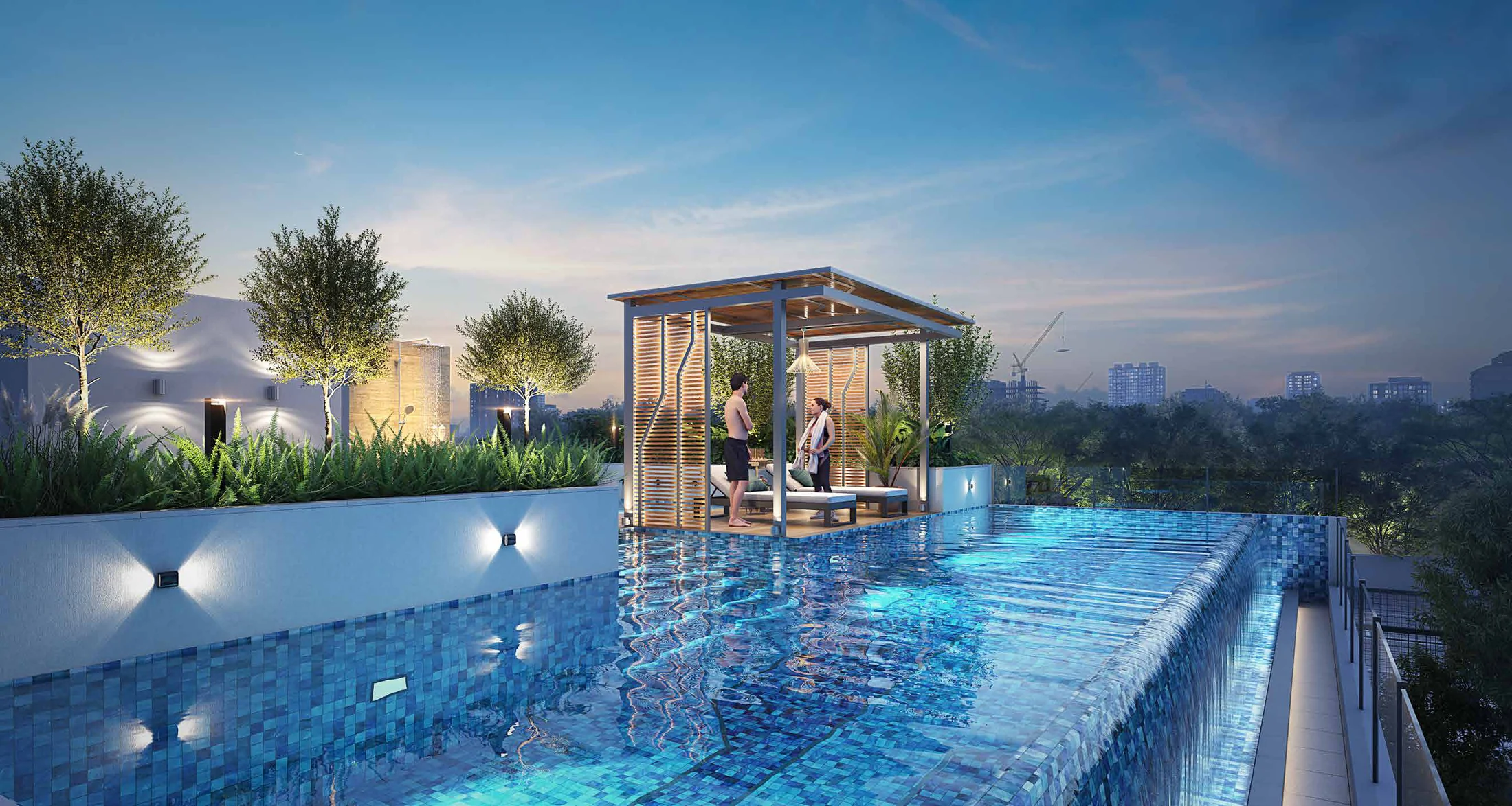 Clubhouse infinity pool with a cabana at Nirvana, Baner