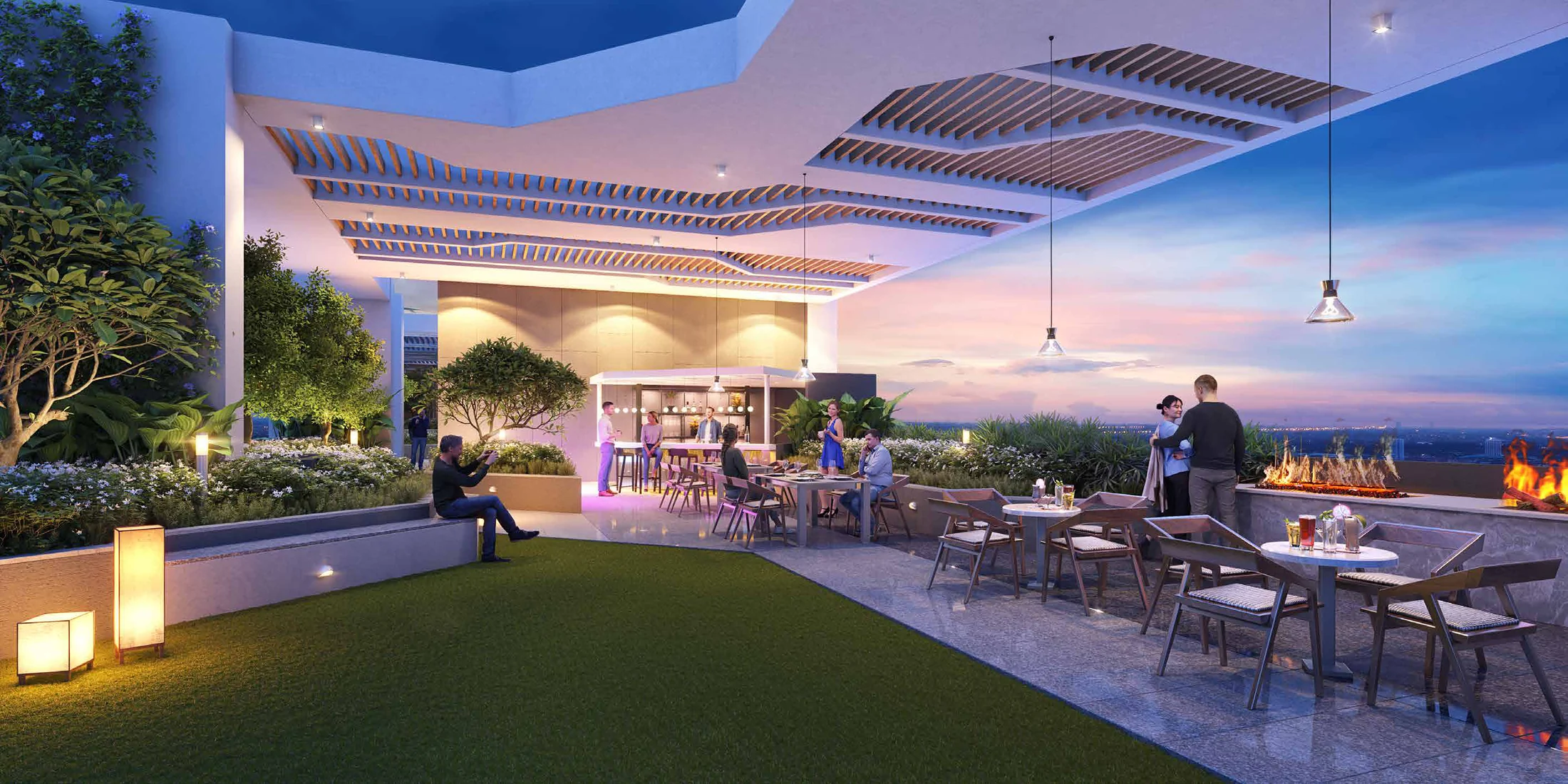 Rooftop sky bar with garden seating and a fire table at Nirvana, Baner