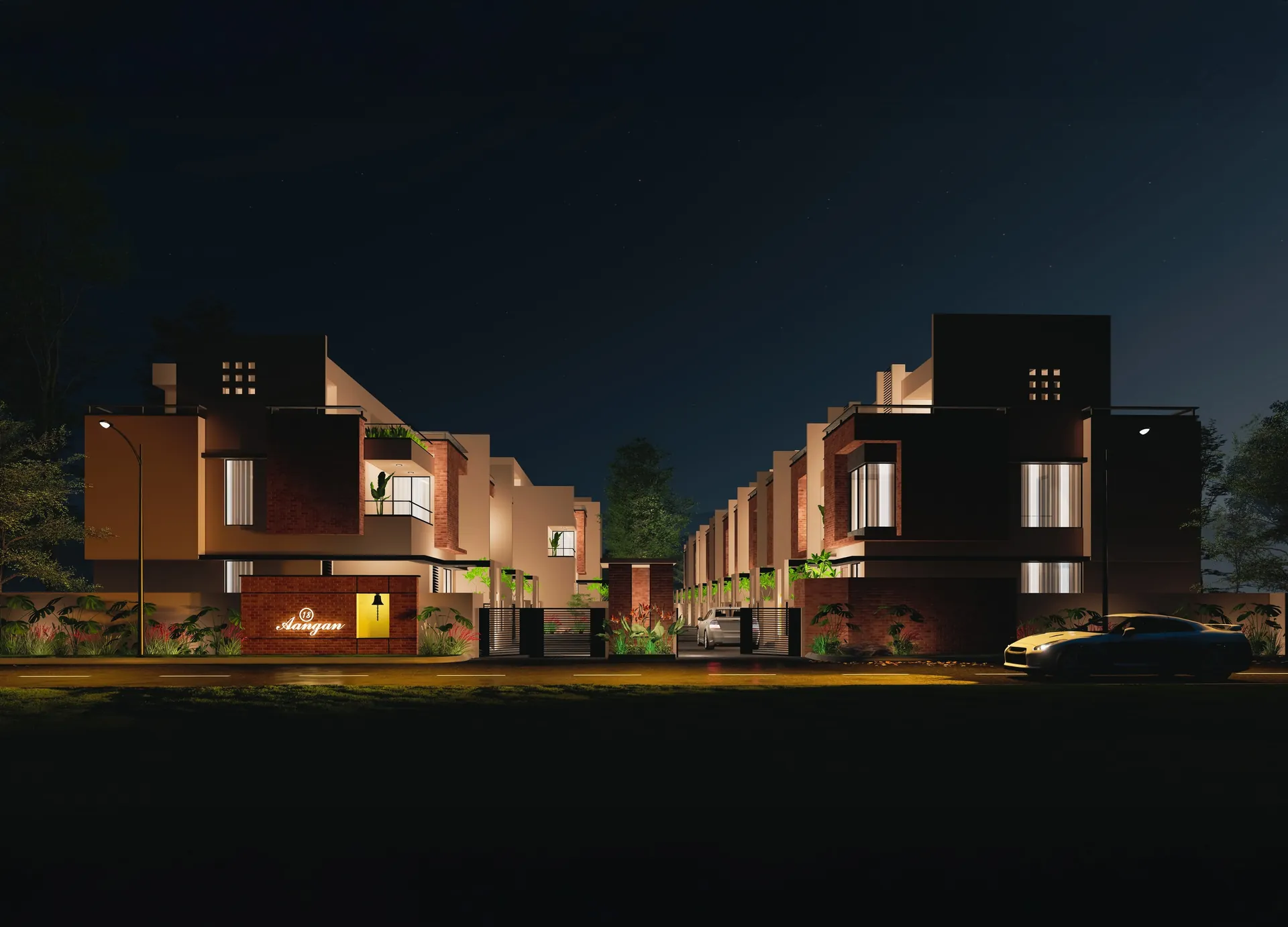 Night view of the row houses and entrance signage at 18 Aangan, Maan