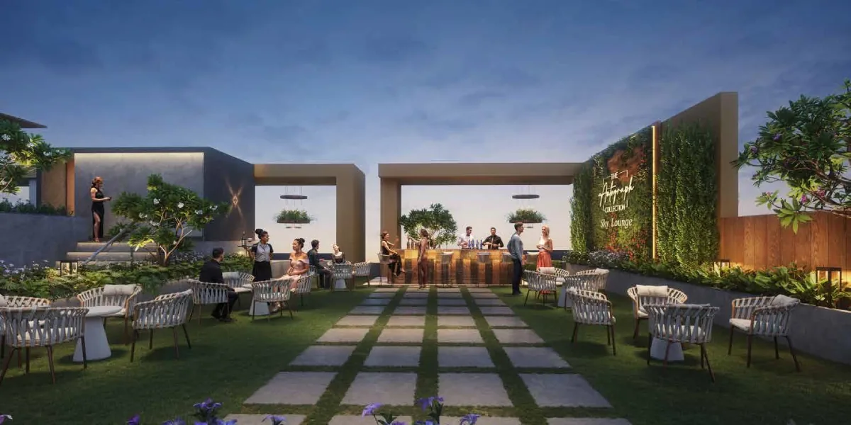 Rooftop sky lounge lawn at dusk at Excellaa Polaris, Bavdhan