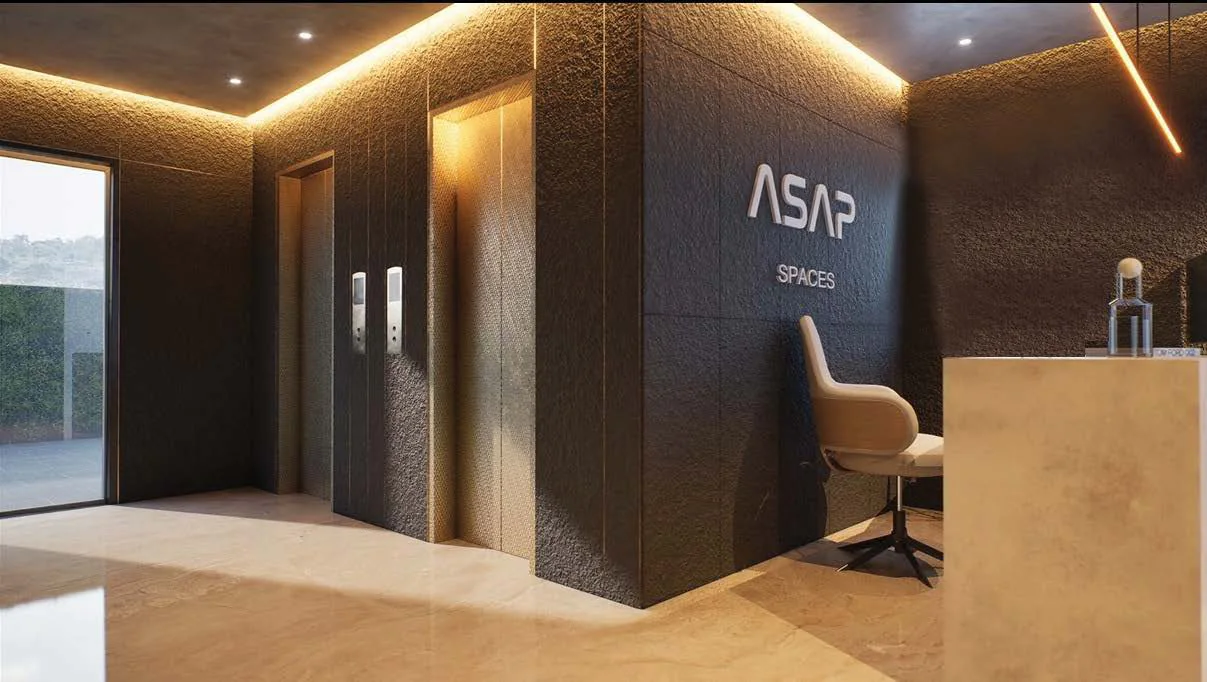 Entrance lobby render with a reception desk and lift doors at ASAP Tishya, Aundh