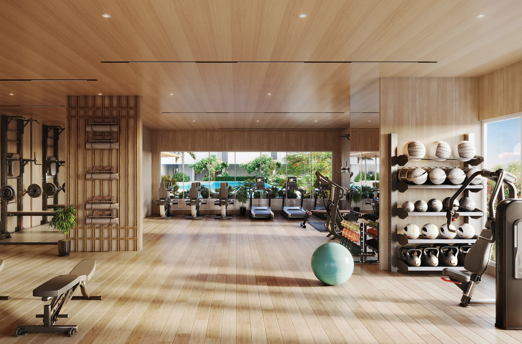 Gymnasium with wooden flooring and free weights at The Reserve, Mundhwa