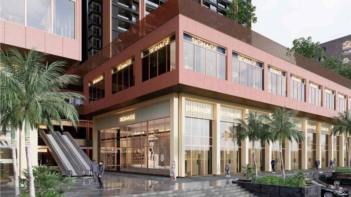 Two-storey retail block with escalator and palms at Yashada Evo, Punawale