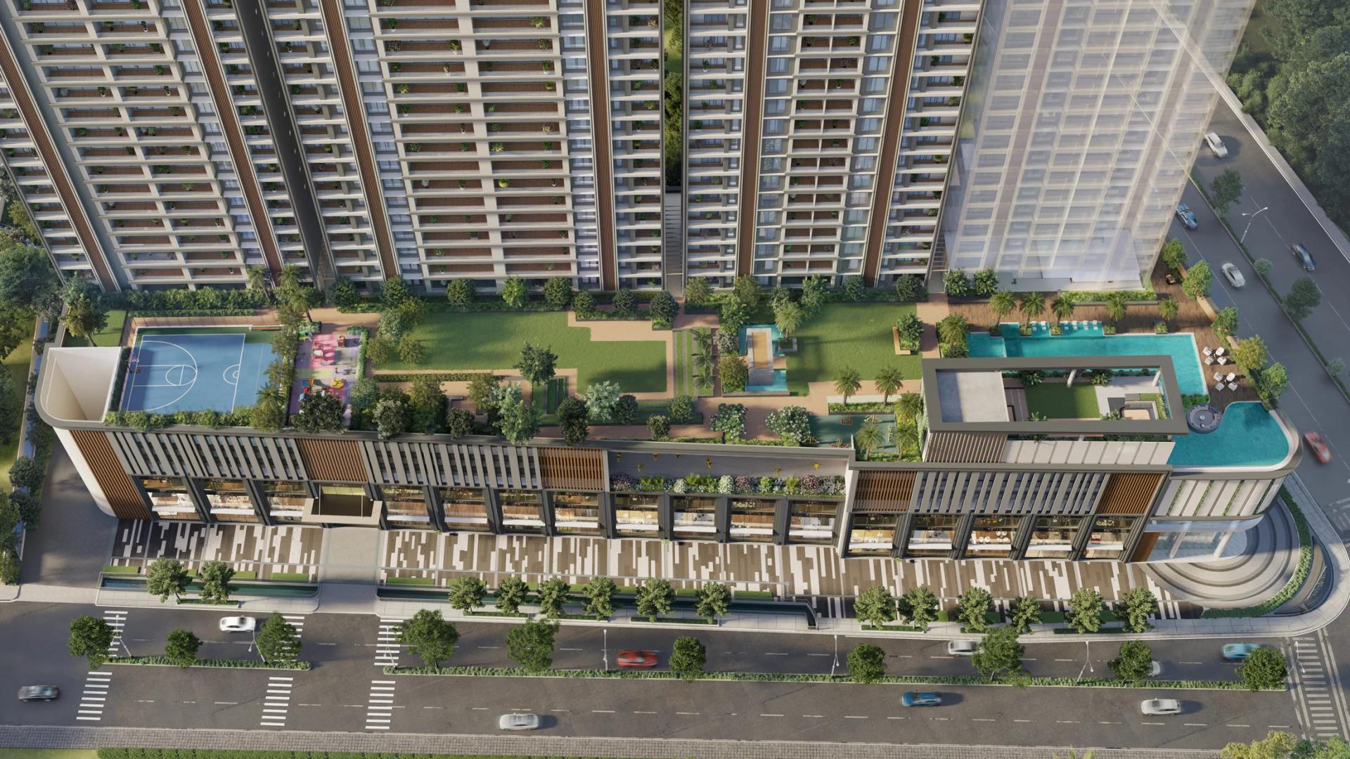 Aerial view of the E-deck pools, courts and gardens at Godrej Skyline, Mundhwa