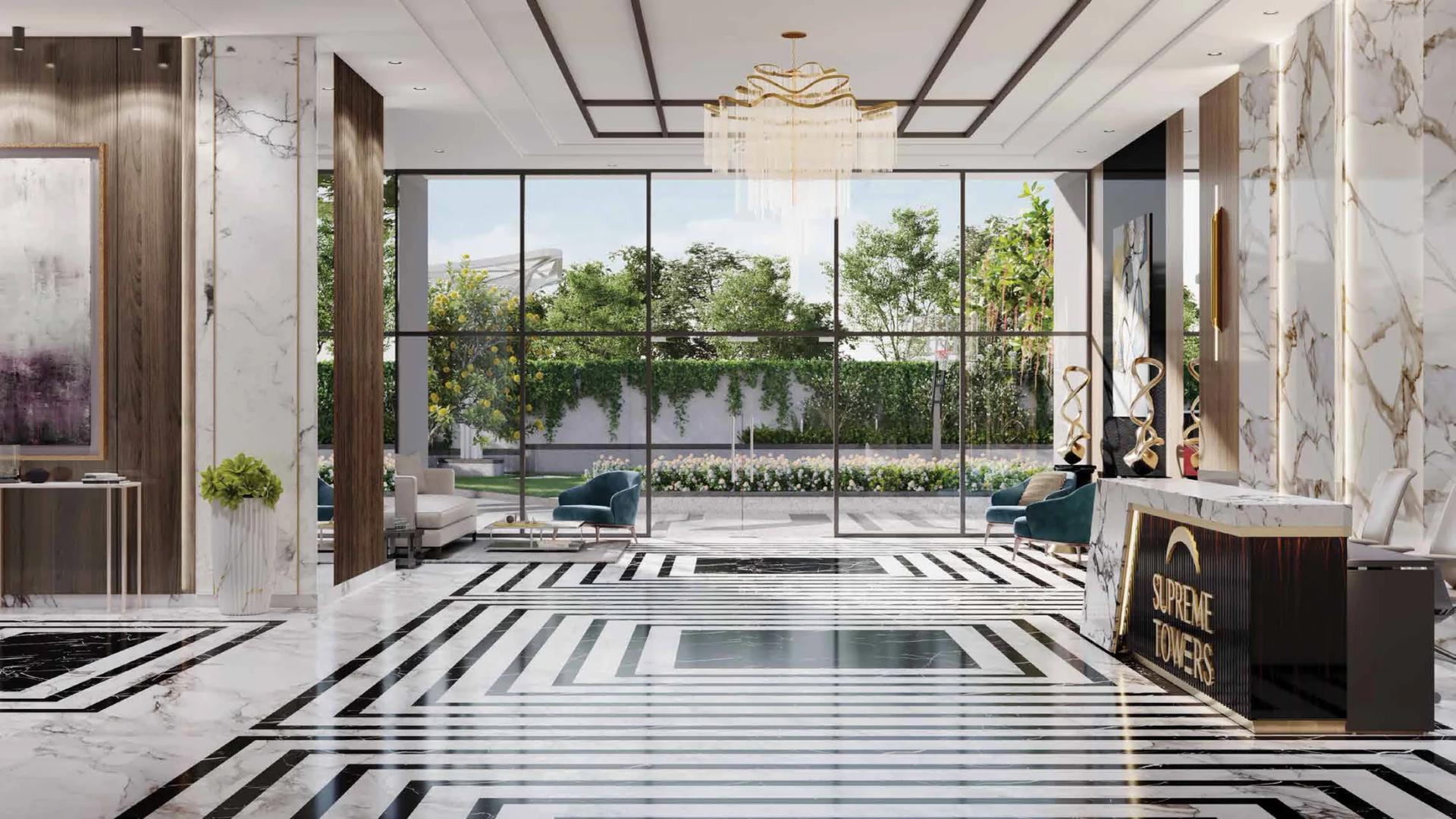 Entrance lobby with marble flooring and a reception desk at Supreme Towers, Mundhwa