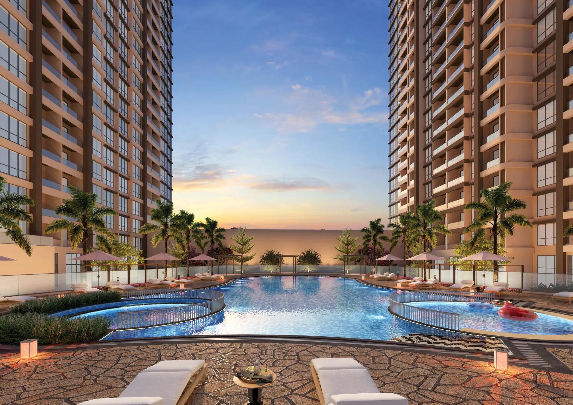 Swimming pool with a kids' pool between the towers at Venkatesh Vanaya, Kharadi