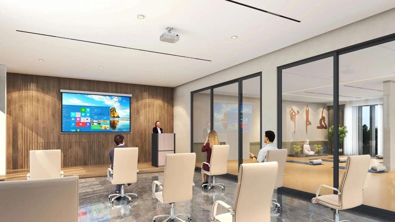 Conference room with screen and chairs at The Westford Phase 2, Pimple Saudagar