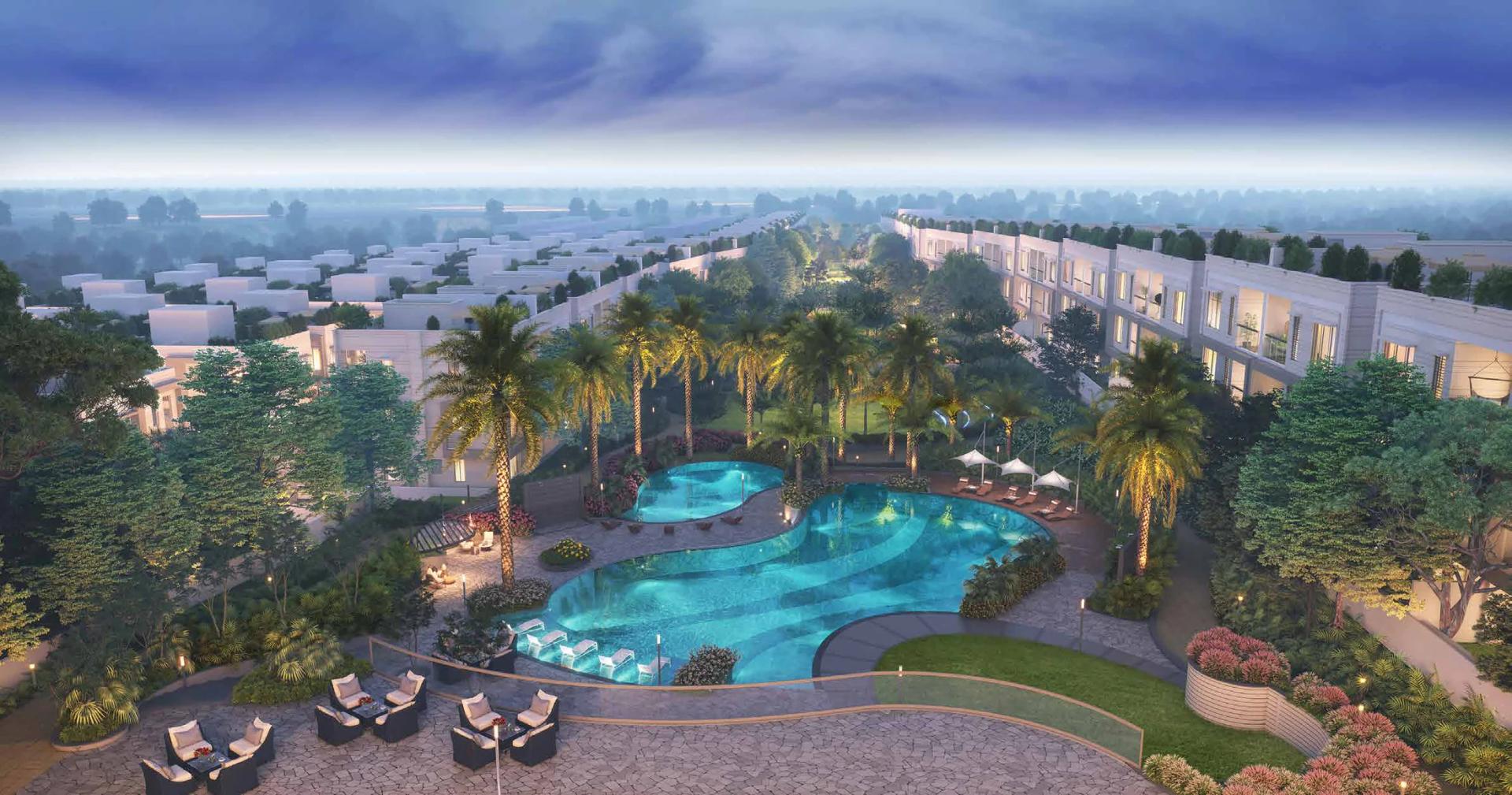 Aerial view of the central boulevard, pool and villas at Supreme Villagio, Somatane