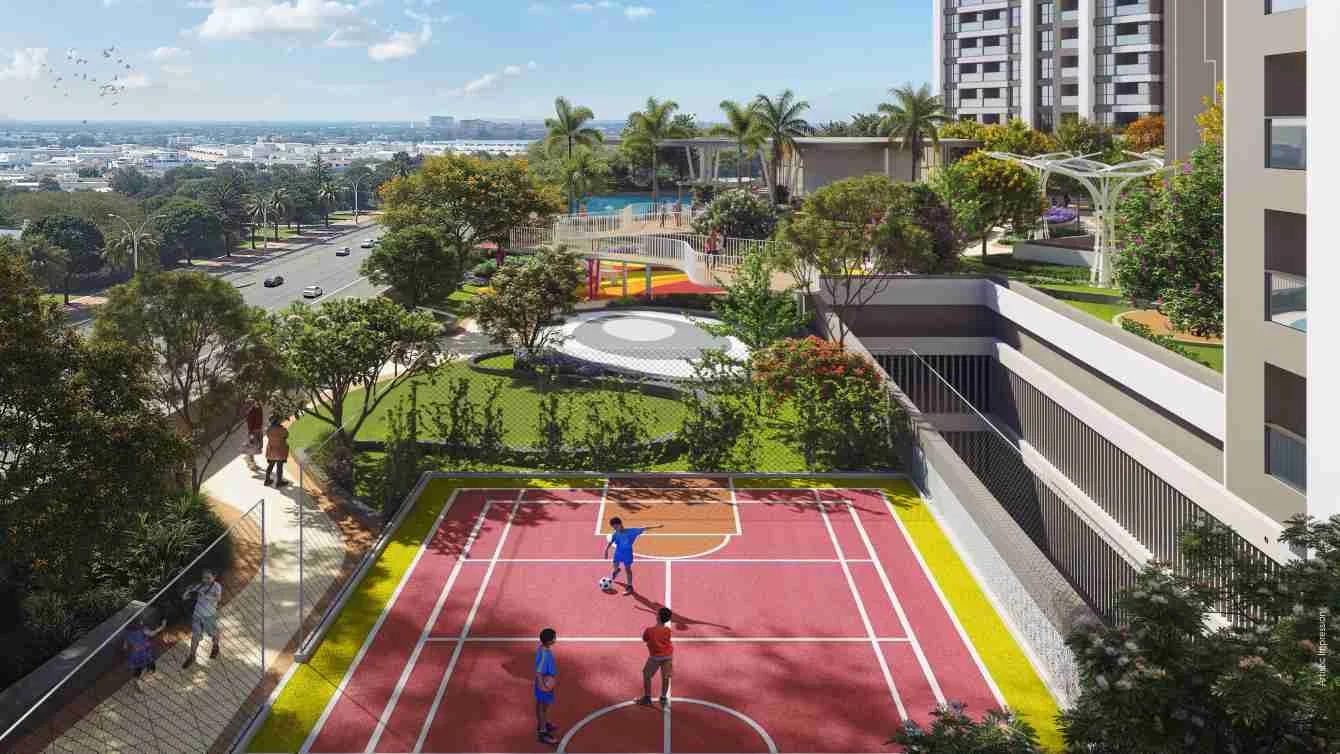 Aerial view of a red sports court with people playing at Yoo pristine, Akurdi